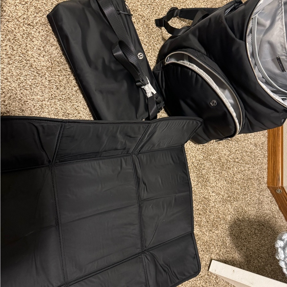 Lulu lemon diaper bag with changing mat and cross body purse
